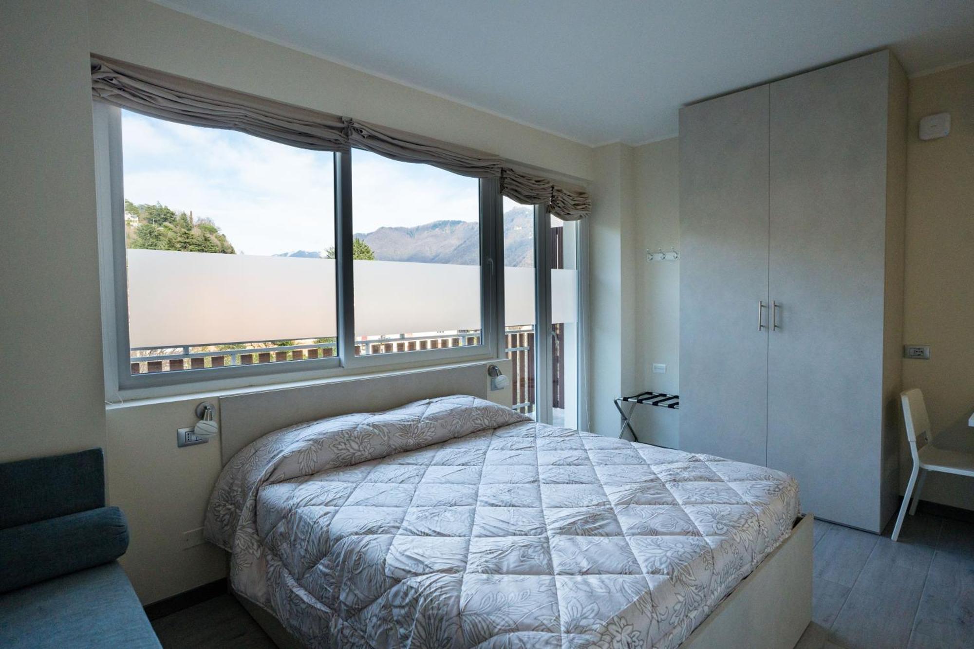 Residence Villa Eli โกโม ภายนอก รูปภาพ